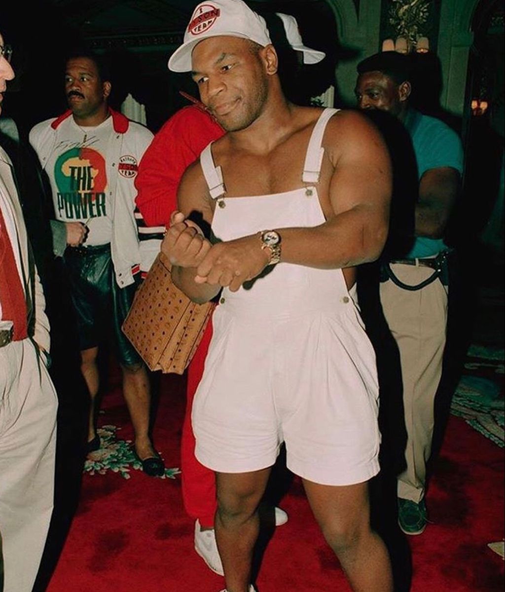 Mike Tyson Wearing White Overalls and White Hat 