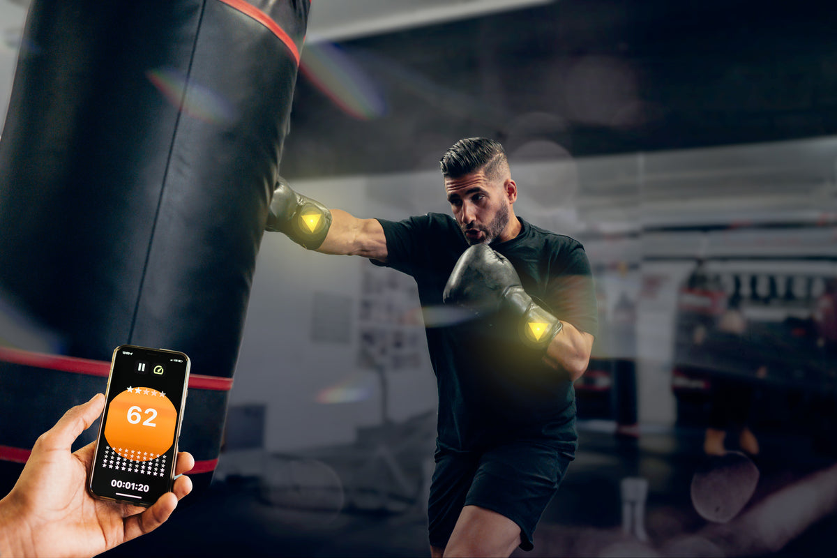 POWA Boxing Technology Tracking Punches with Boxer in Background 